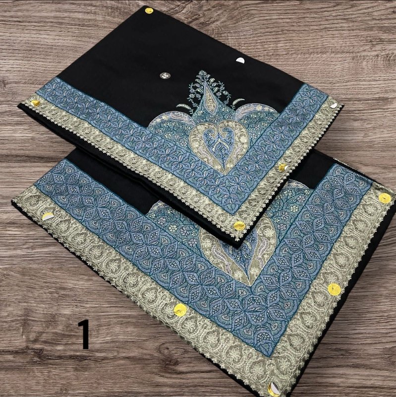 أطقم الأب والابن بنفس الأوان والنقوش